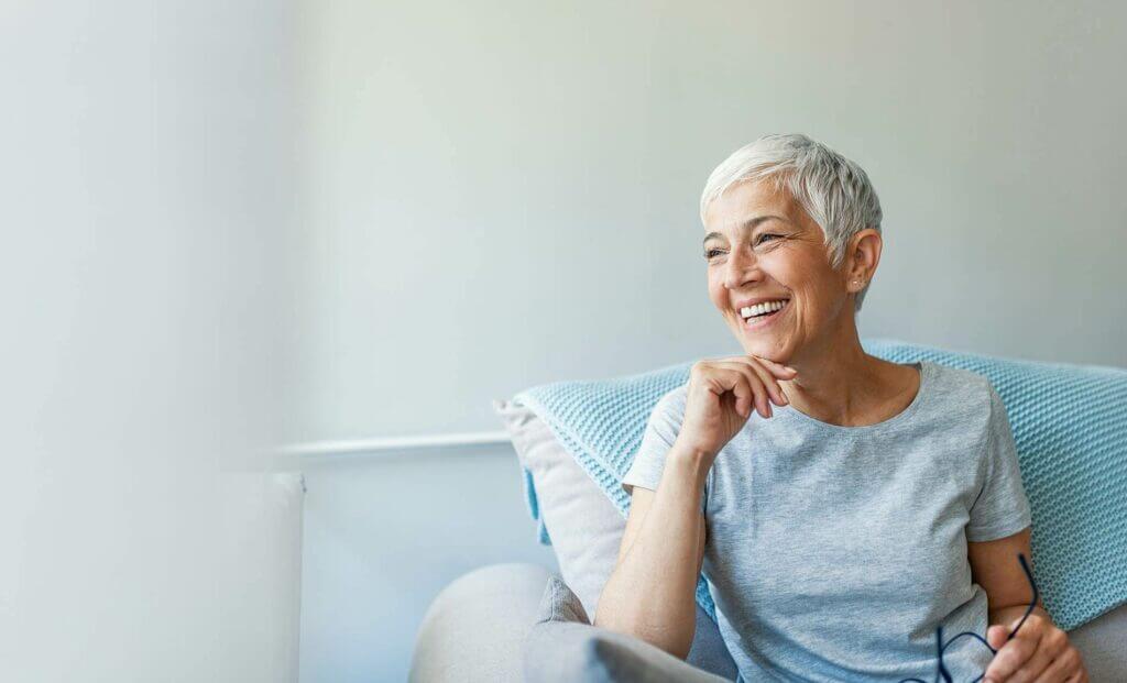 Hip mature woman on couch